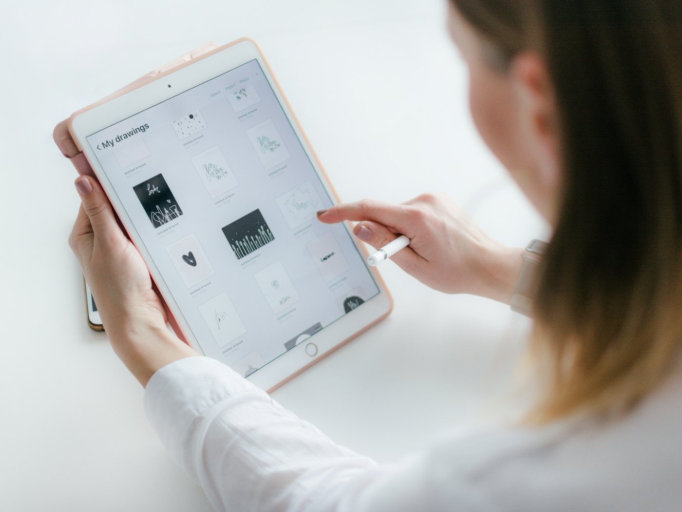 Someone reading an article on a tablet